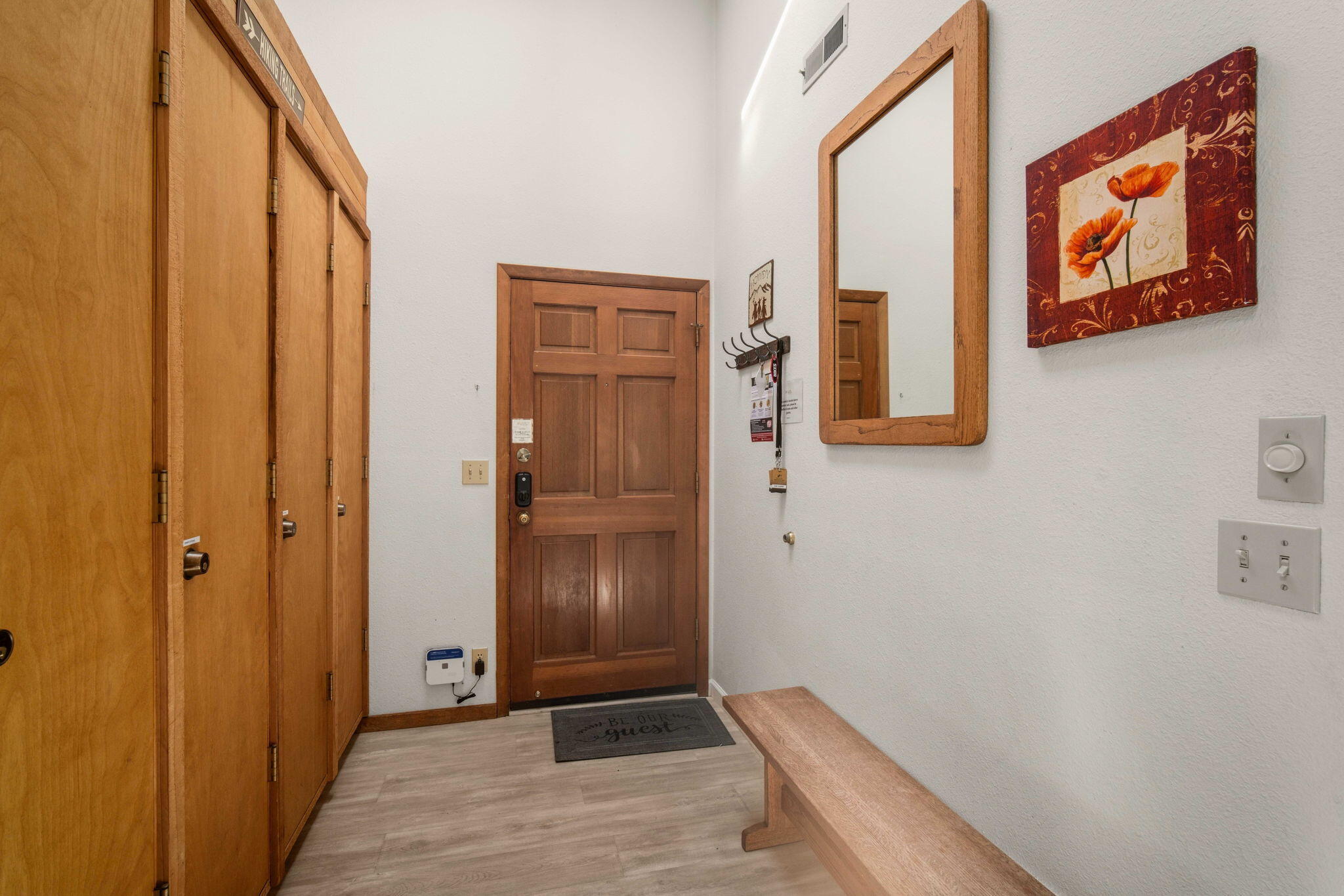 57305 Beaver Ridge Loop, Unit 8 Sunriver, OR 97707 - Photo 3 of 25 a view of an entryway with wooden floor