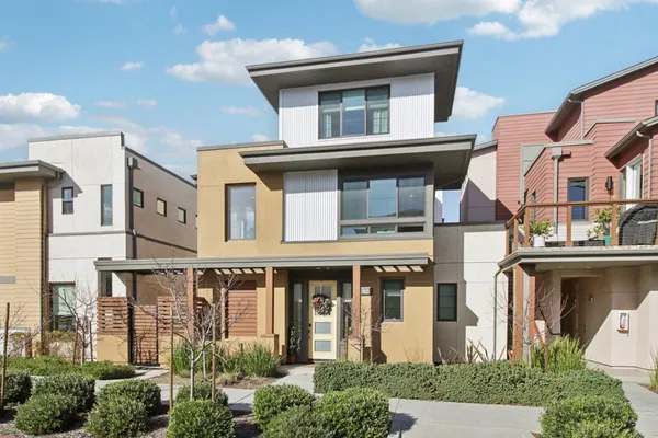 front view of a building with a yard