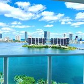 a view of a lake from a balcony