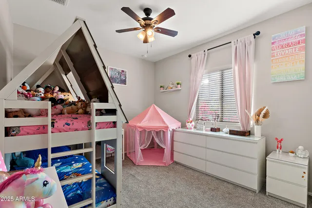 a room with toys and a book shelf