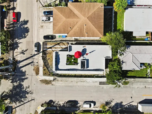 a view of building and car parked