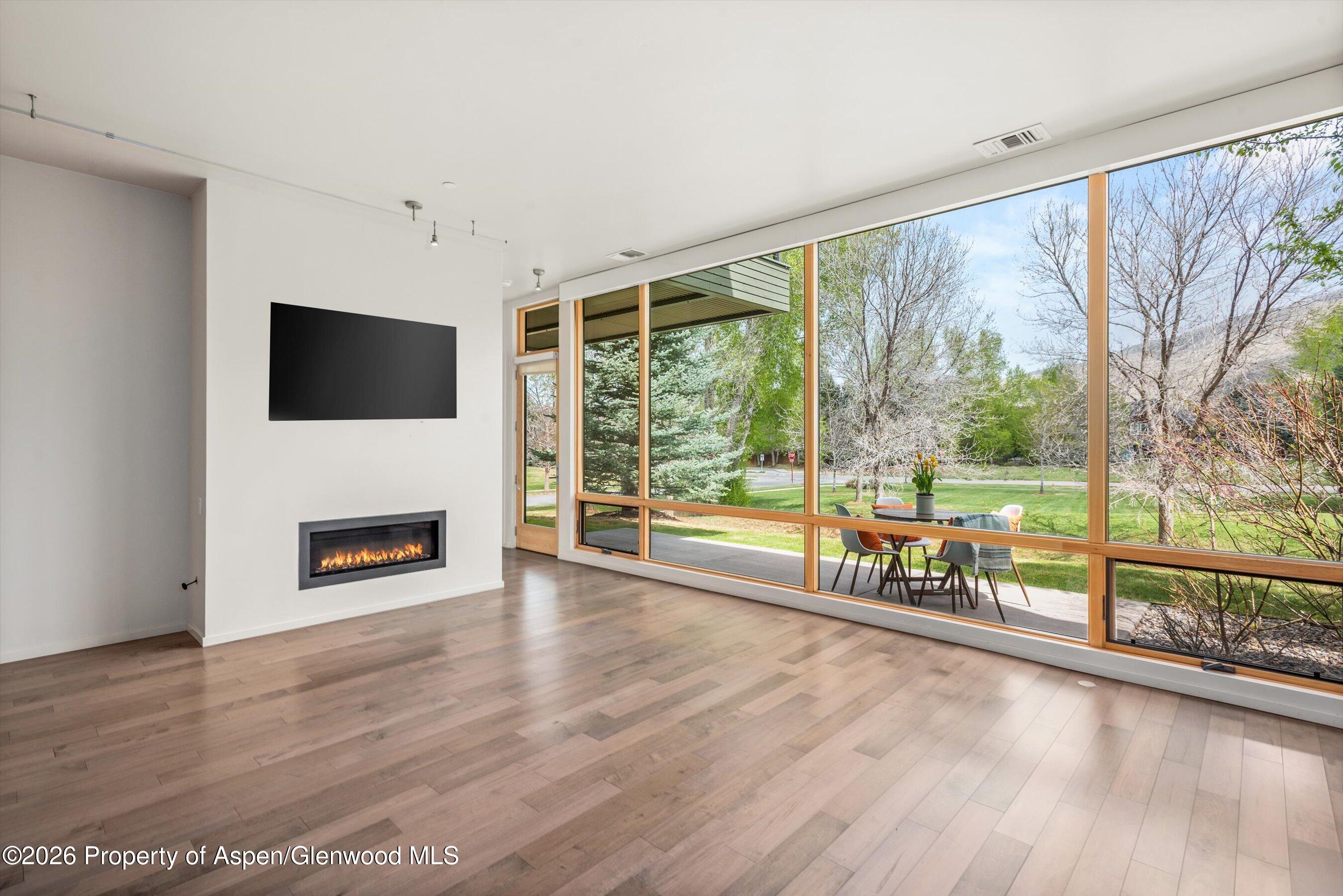 202 Evans Road, Unit 101 Basalt, CO 81621 - Photo 7 of 28 Easy patio access from living room