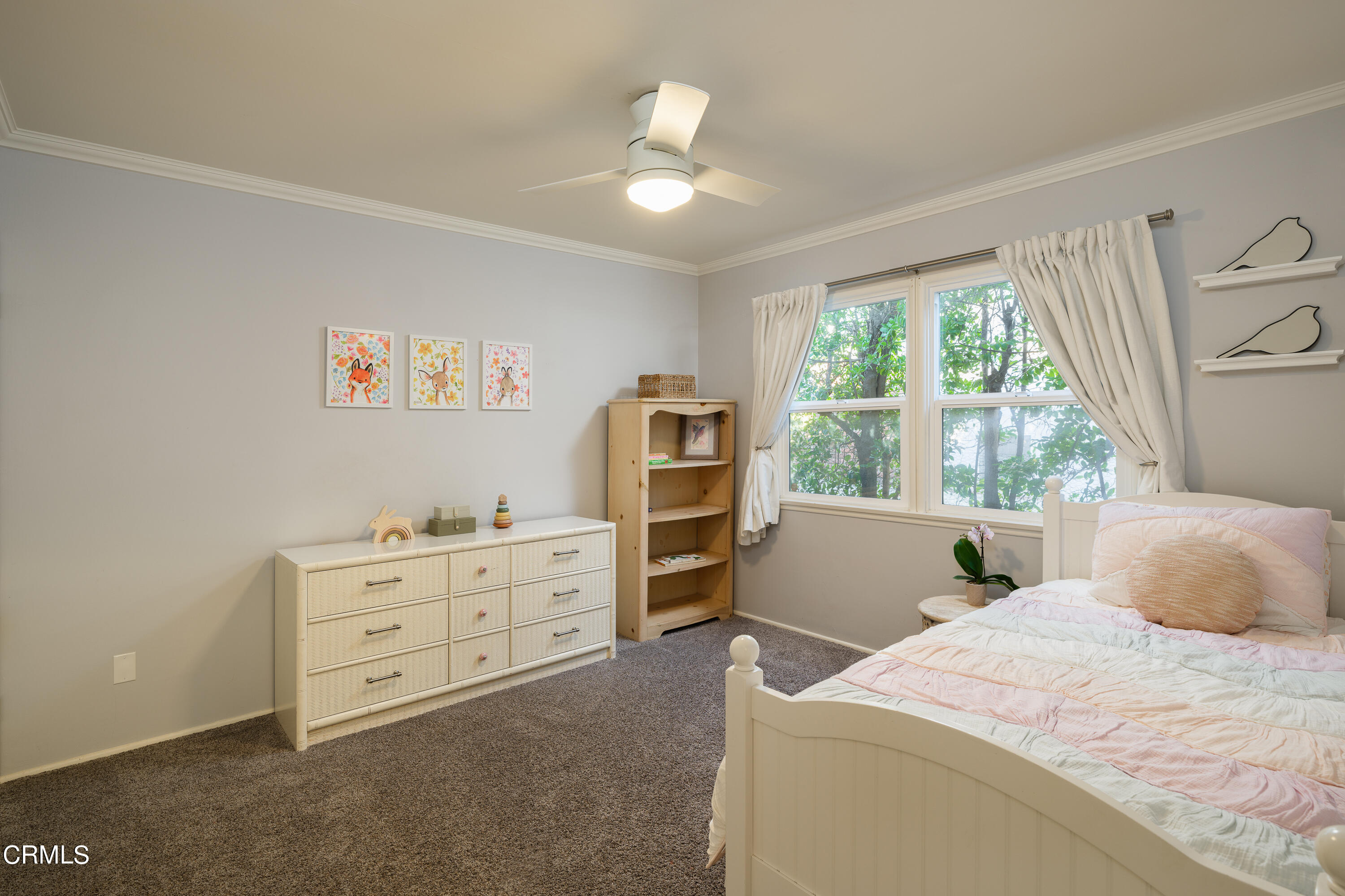 4344 El Prieto Road Altadena, CA 91001 - Photo 13 of 31 a bedroom with a bed and a chandelier