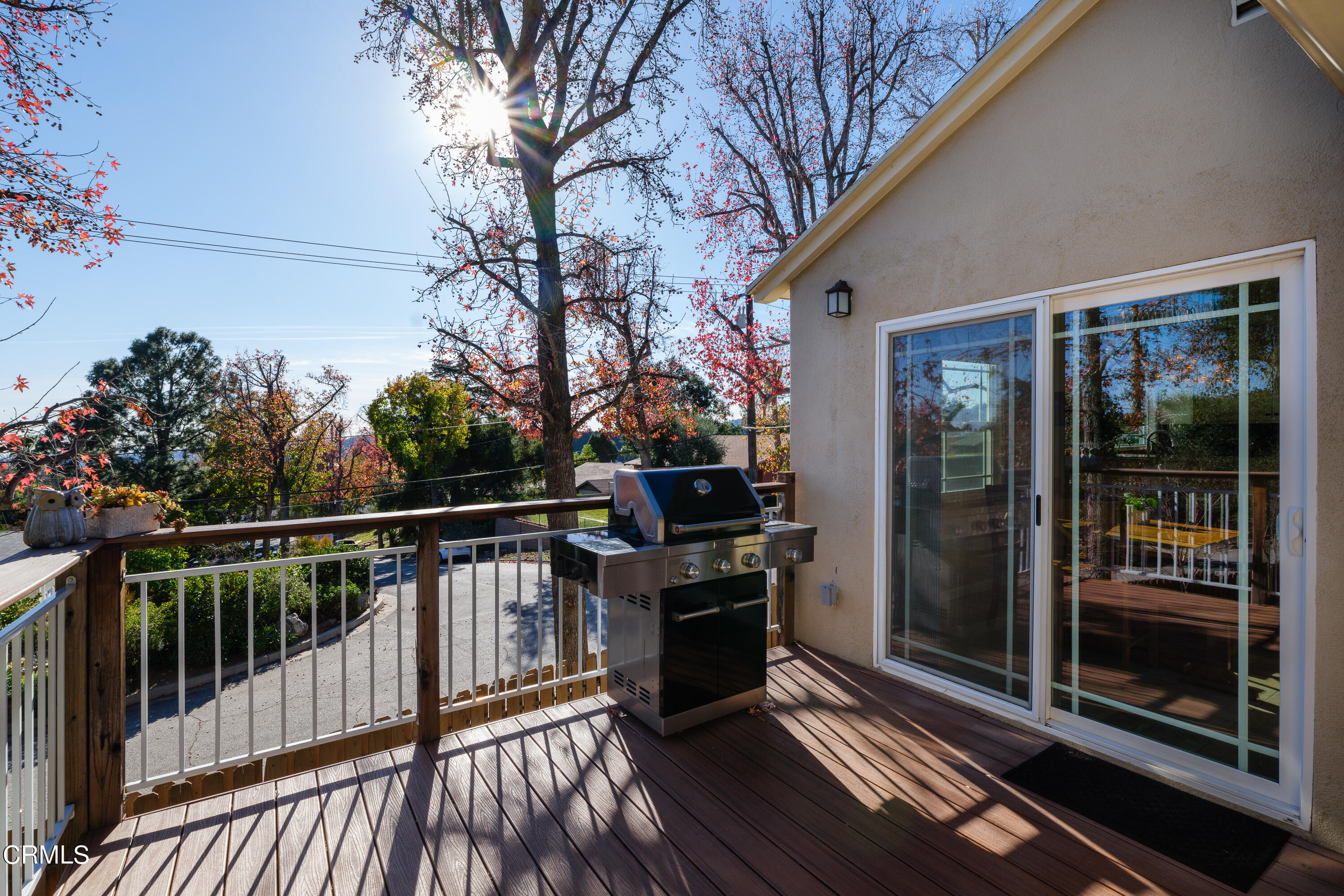 4344 El Prieto Road Altadena, CA 91001 - Photo 27 of 31 a view of a balcony with floor to ceiling window wooden floor and outdoor seating