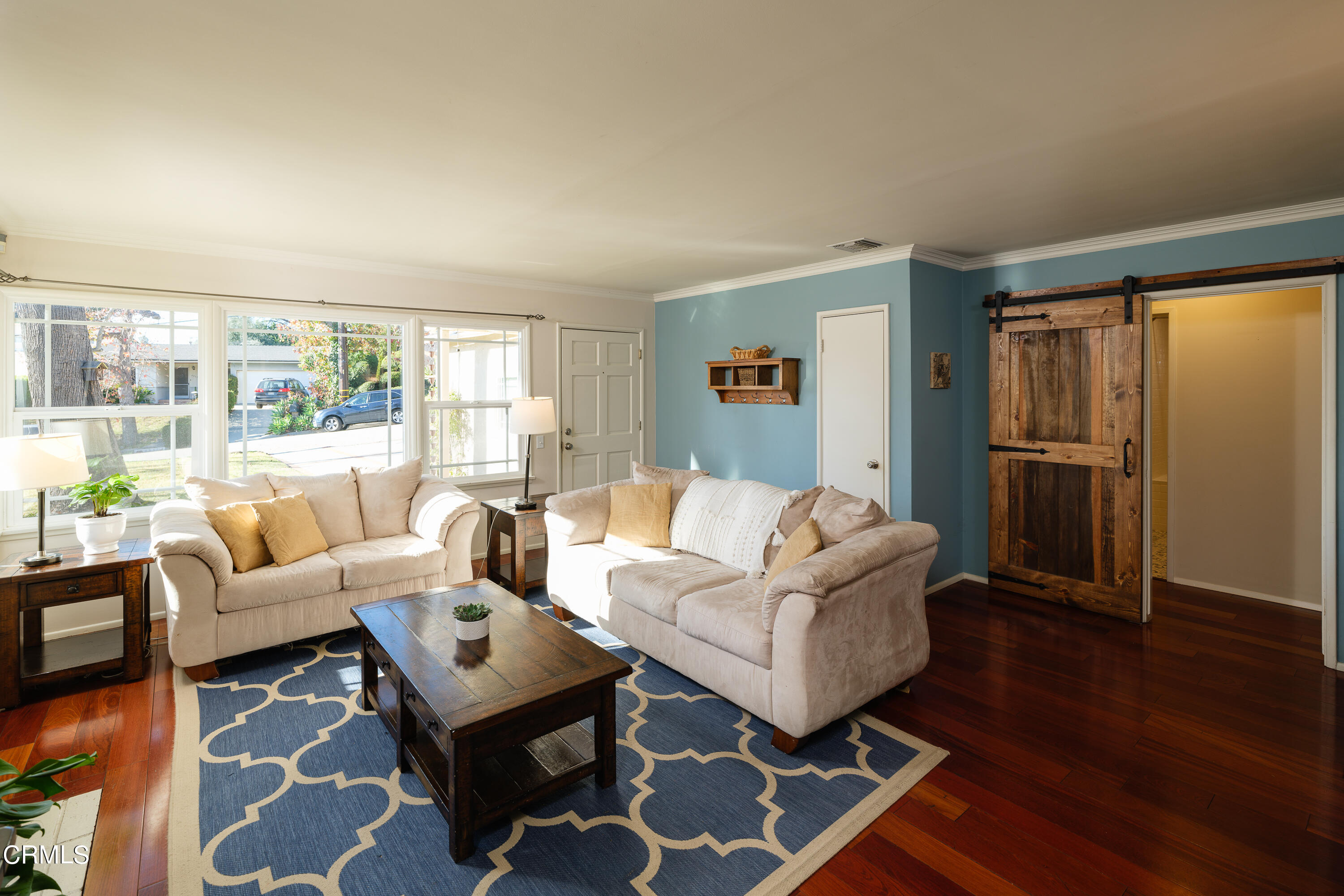 4344 El Prieto Road Altadena, CA 91001 - Photo 5 of 31 a living room with furniture wooden floor and a table