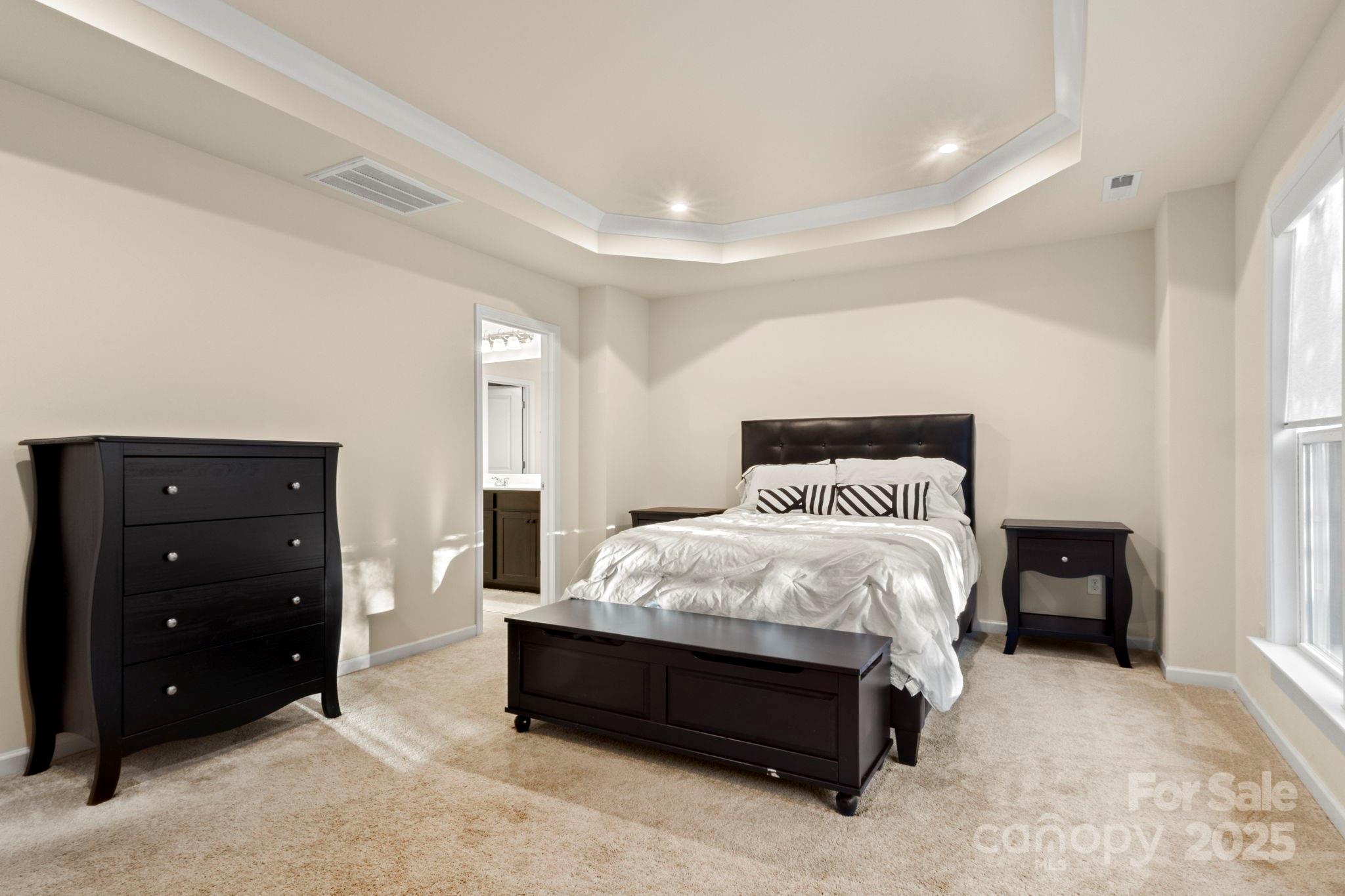 525 Hunters Dance Road Fort Mill, SC 29708 - Photo 14 of 28 a bed room with a bed and a dresser