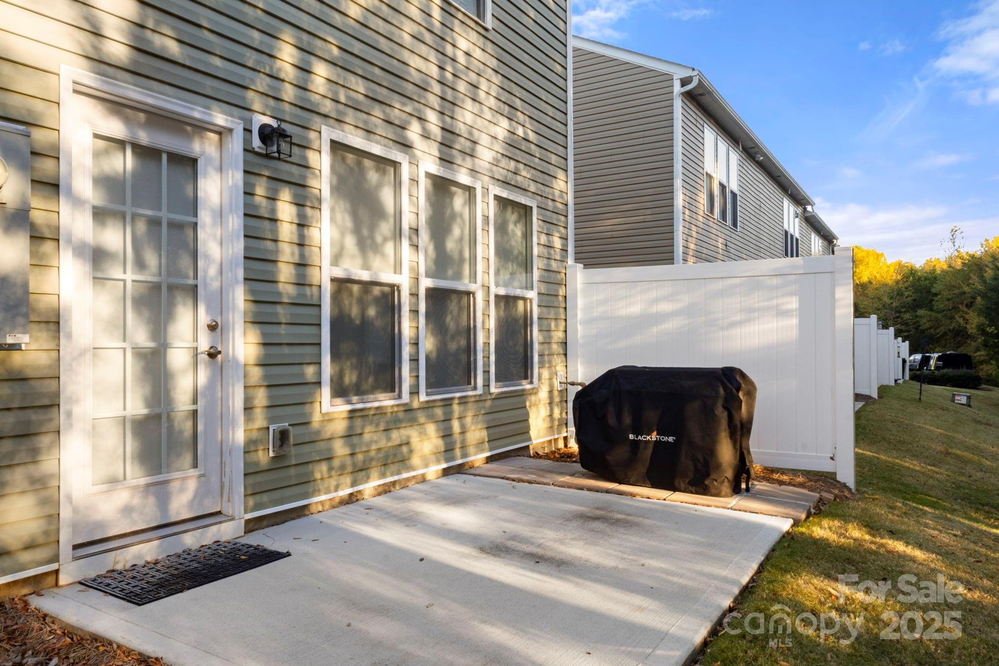 525 Hunters Dance Road Fort Mill, SC 29708 - Photo 25 of 28 a front view of a house with a yard