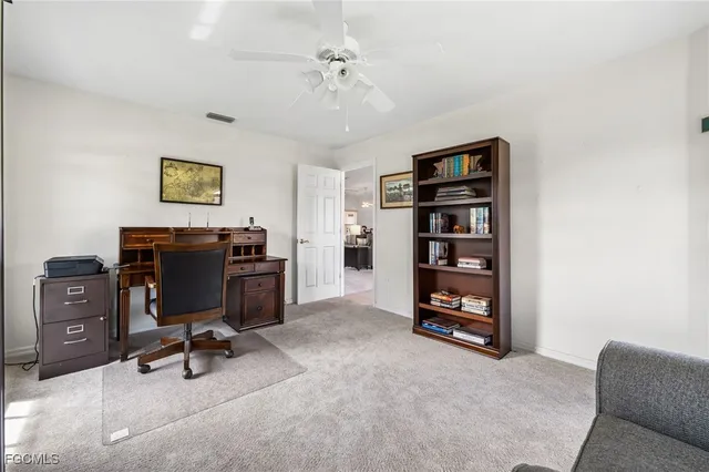 a view of a kitchen with appliances and cabinets