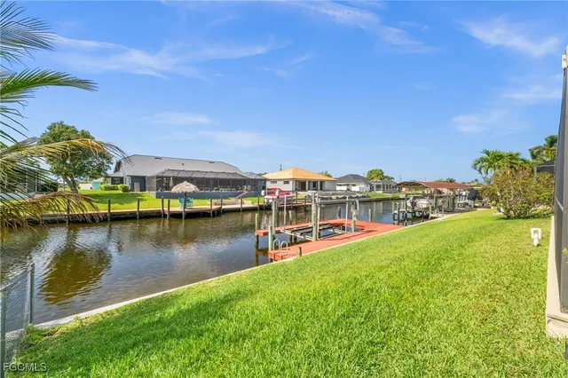 a view of a lake with a house