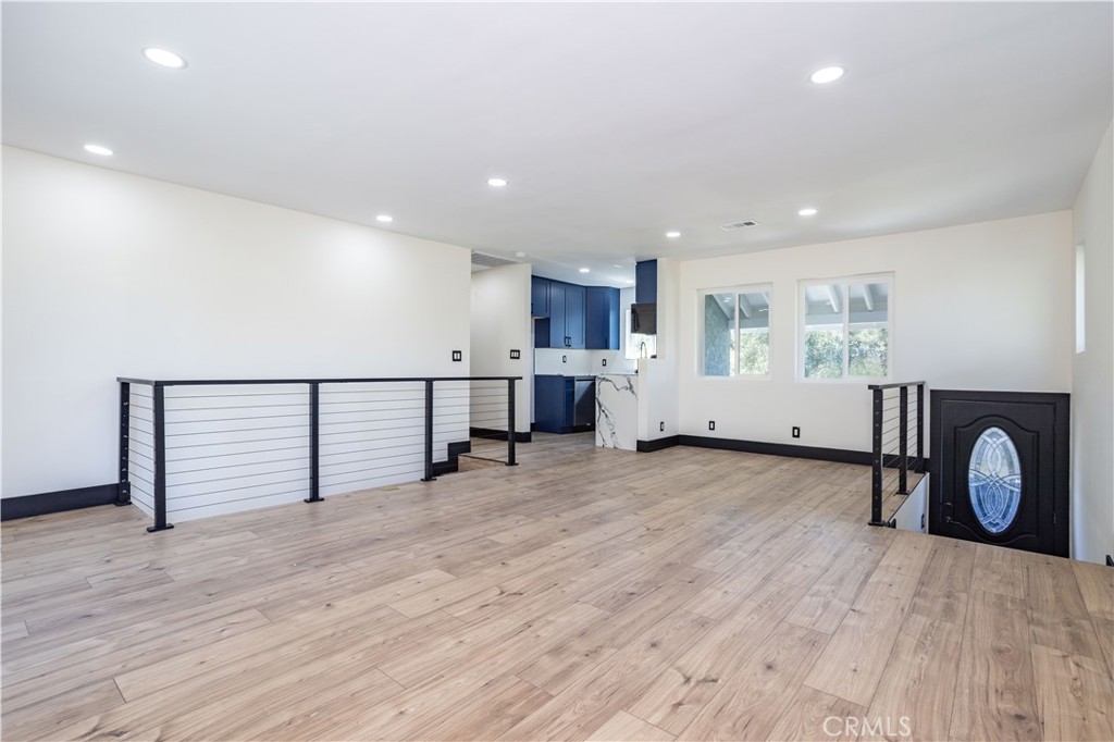 42640 Ranch Club Road Lake Hughes, CA 93532 - Photo 3 of 27 a view of a room with wooden floor and window