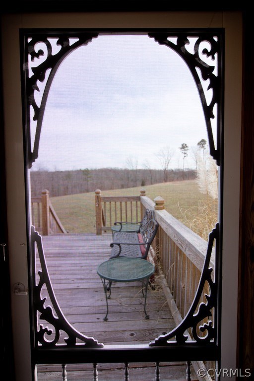 301 Slaughter Road Keysville, VA 23947 - Photo 20 of 50 a view of a balcony with chairs