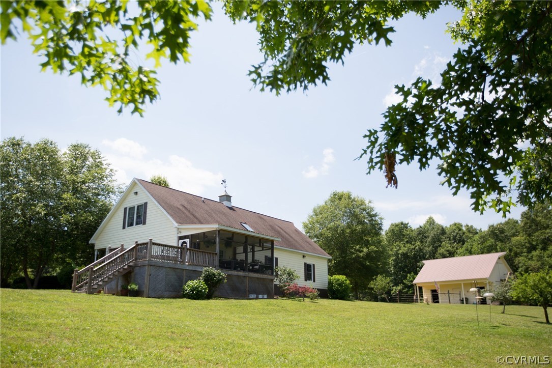301 Slaughter Road Keysville, VA 23947 - Photo 26 of 50 a view of house with garden space and trees