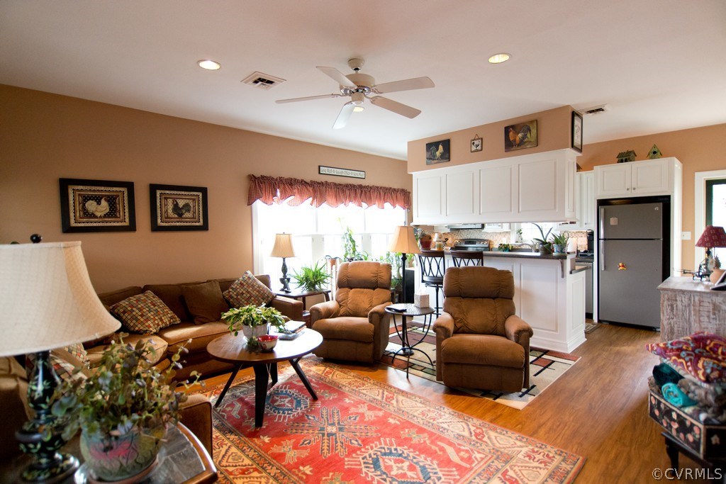 301 Slaughter Road Keysville, VA 23947 - Photo 8 of 50 a living room with furniture and a fireplace