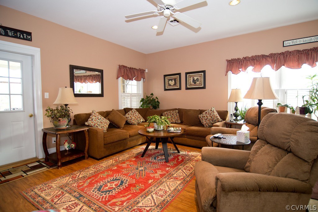301 Slaughter Road Keysville, VA 23947 - Photo 10 of 50 a living room with furniture and a window