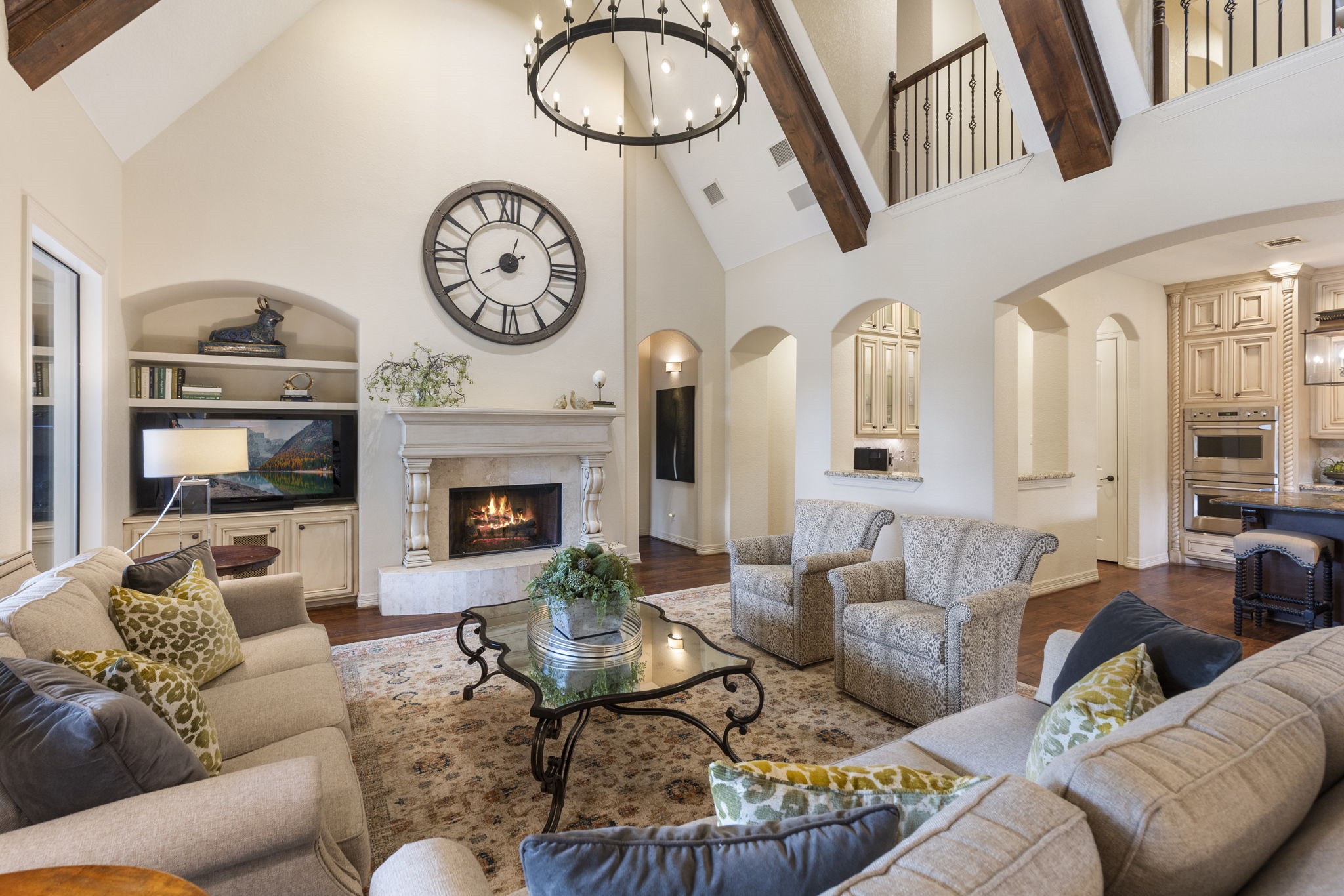 28227 KAILEES Court Spring, TX 77386 - Photo 16 of 48 a living room with furniture a large mirror and a fireplace