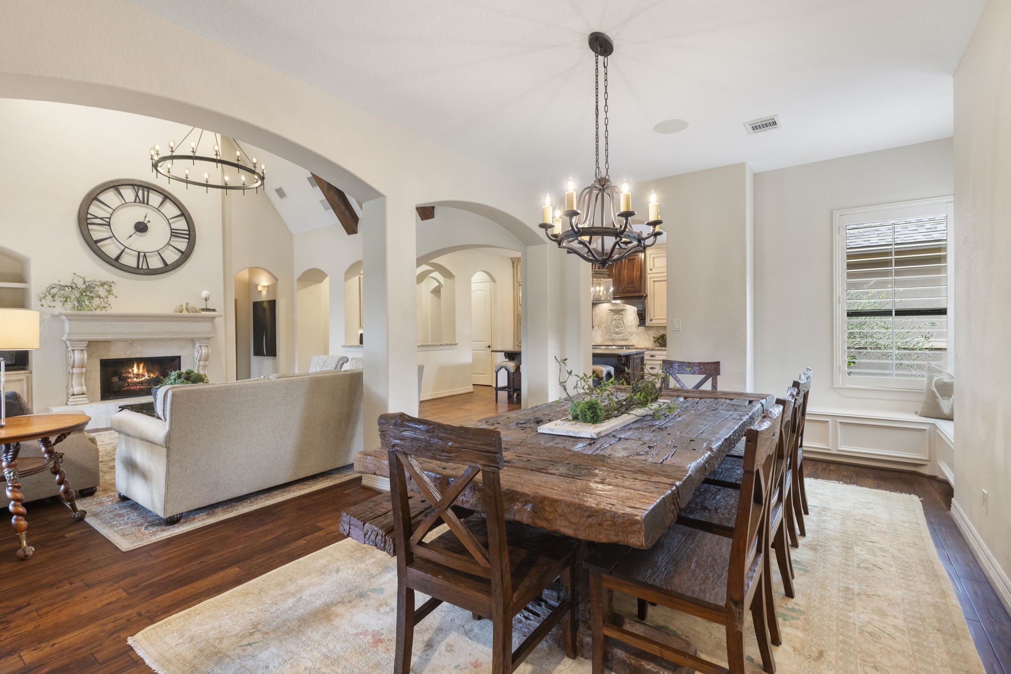 28227 KAILEES Court Spring, TX 77386 - Photo 17 of 48 Generous family dining area (19' x 12') with wood flooring, decorative lighting, and a charming window bench with storage. Sound system and direct access to the back patio make this space perfect for everyday living and entertaining.