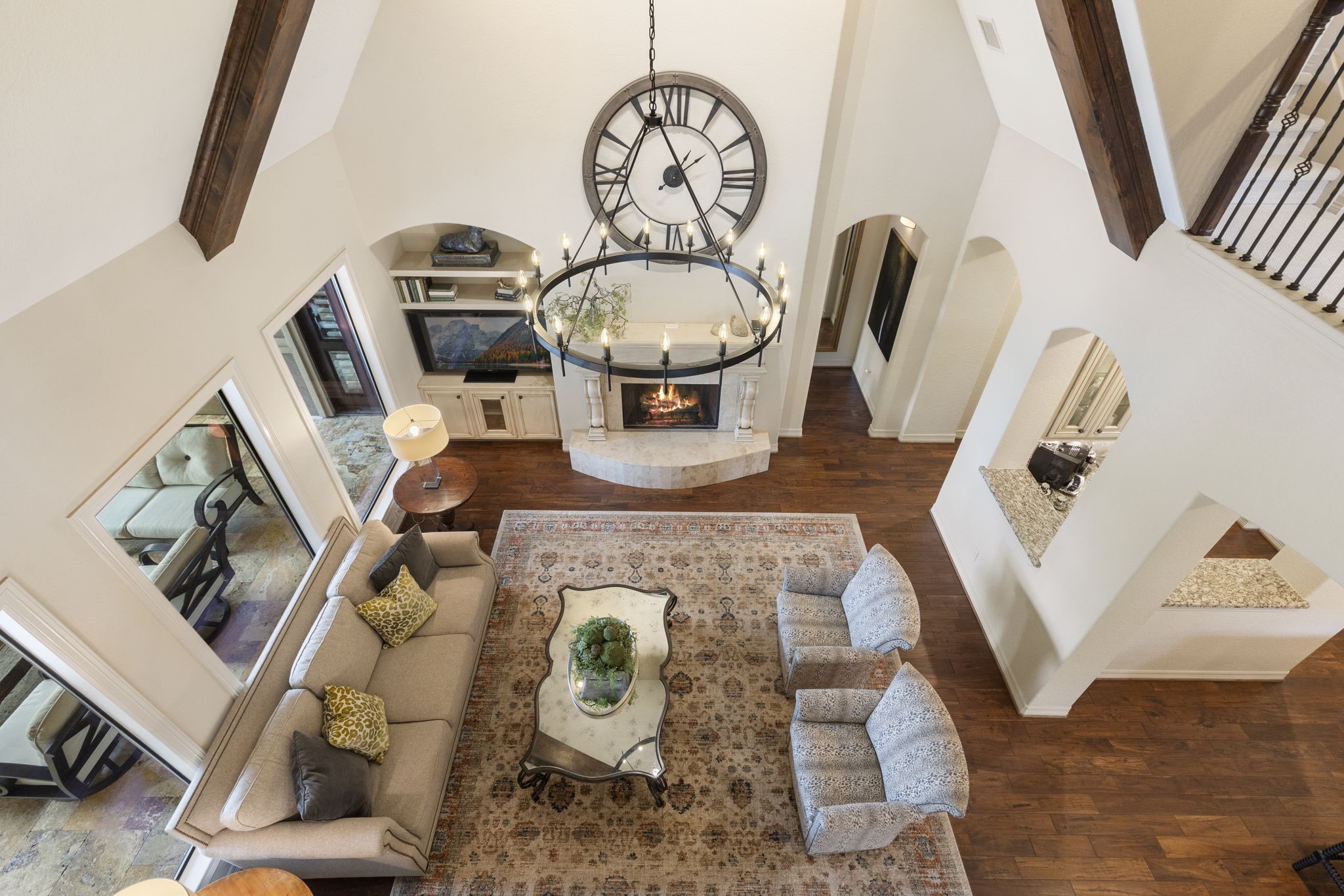 28227 KAILEES Court Spring, TX 77386 - Photo 24 of 48 Open second-floor overlook providing a dramatic perspective of the home’s soaring ceilings and beautifully designed living spaces below.