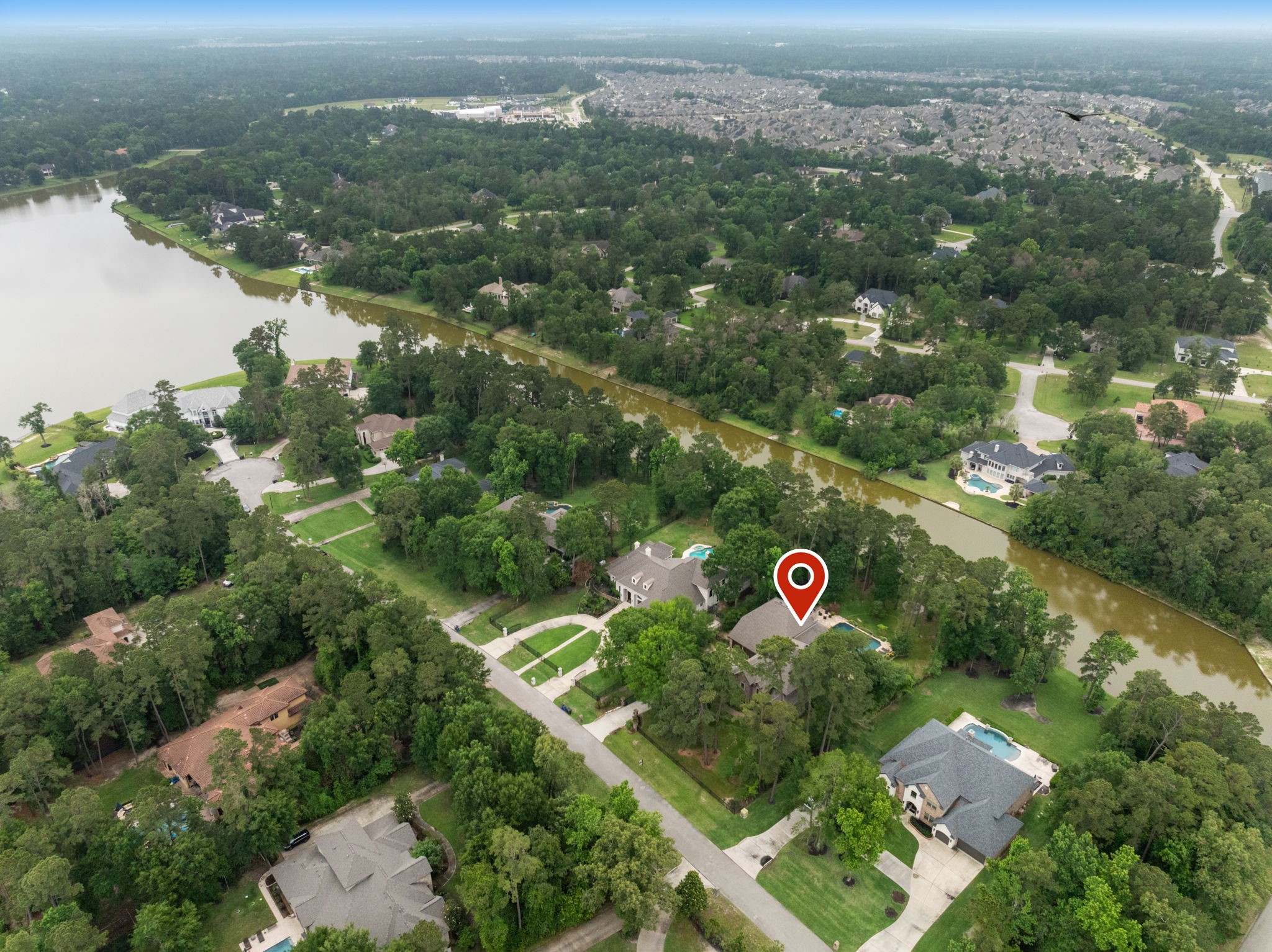 28227 KAILEES Court Spring, TX 77386 - Photo 45 of 48 Situated on the community’s largest lake (72 acres), offering expansive water views and exceptional waterfront living.