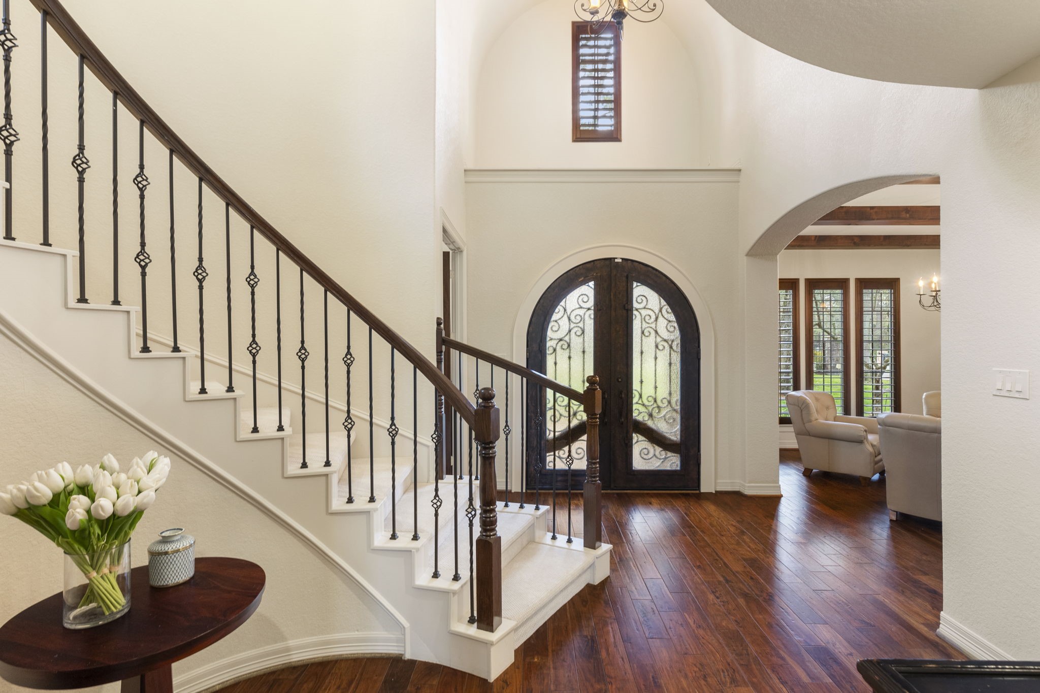 28227 KAILEES Court Spring, TX 77386 - Photo 9 of 48 Exceptional architectural detail and craftsmanship are evident the moment you enter—an impressive introduction that sets the tone for this stunning custom estate.
