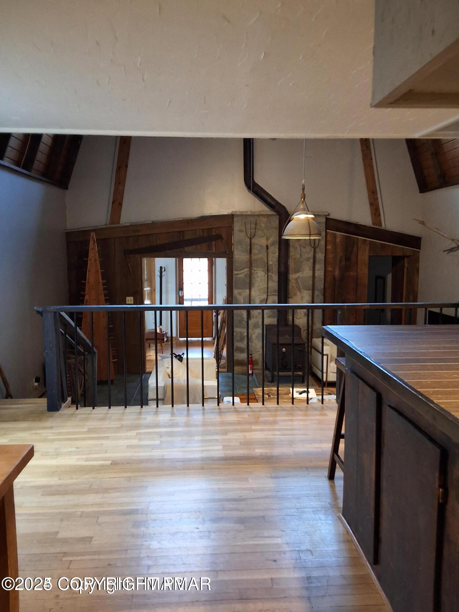 169 Saunders Drive Bushkill, PA 18324 - Photo 31 of 100 a view of entryway and hall with wooden floor