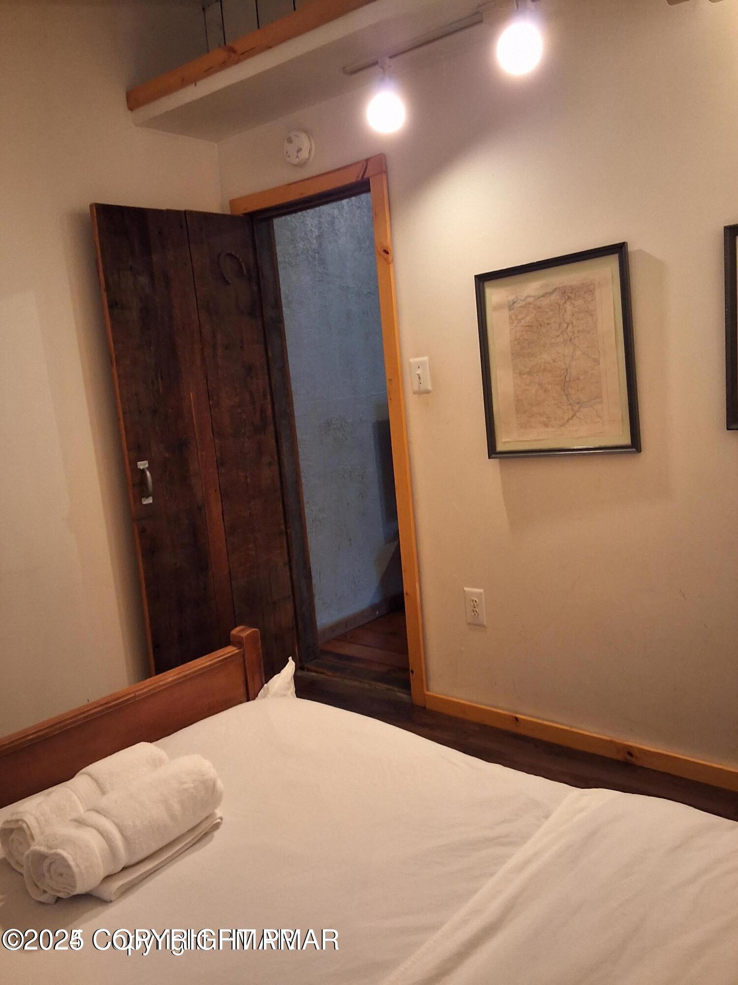 169 Saunders Drive Bushkill, PA 18324 - Photo 50 of 100 a bed room with a mirror