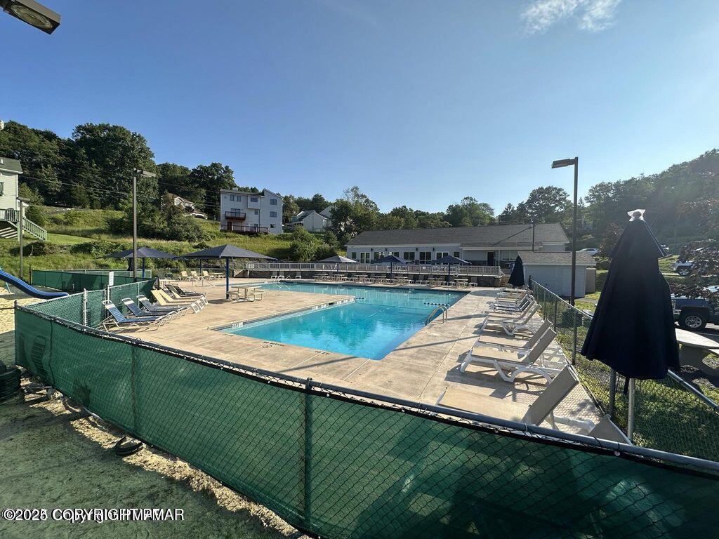 169 Saunders Drive Bushkill, PA 18324 - Photo 76 of 100 an aerial view of a house having yard