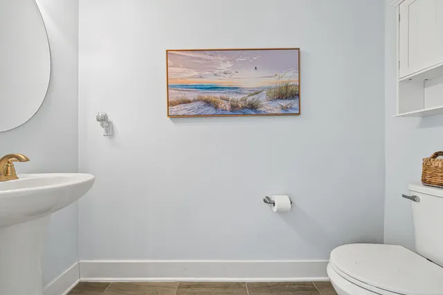 a bathroom with a toilet and a sink