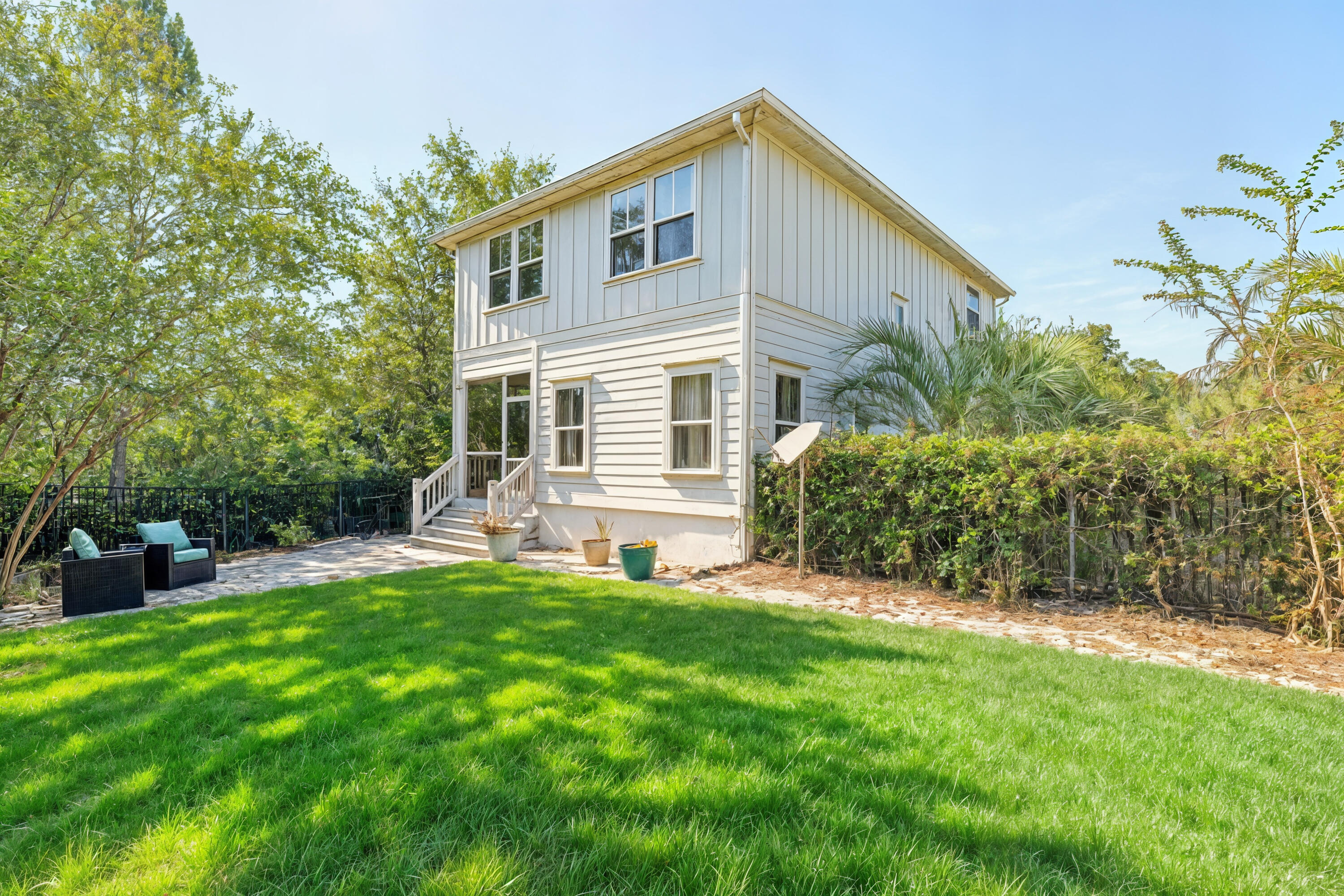 178 Melrose Avenue Santa Rosa Beach, FL 32459 - Photo 2 of 45 a view of a house with a yard and sitting area