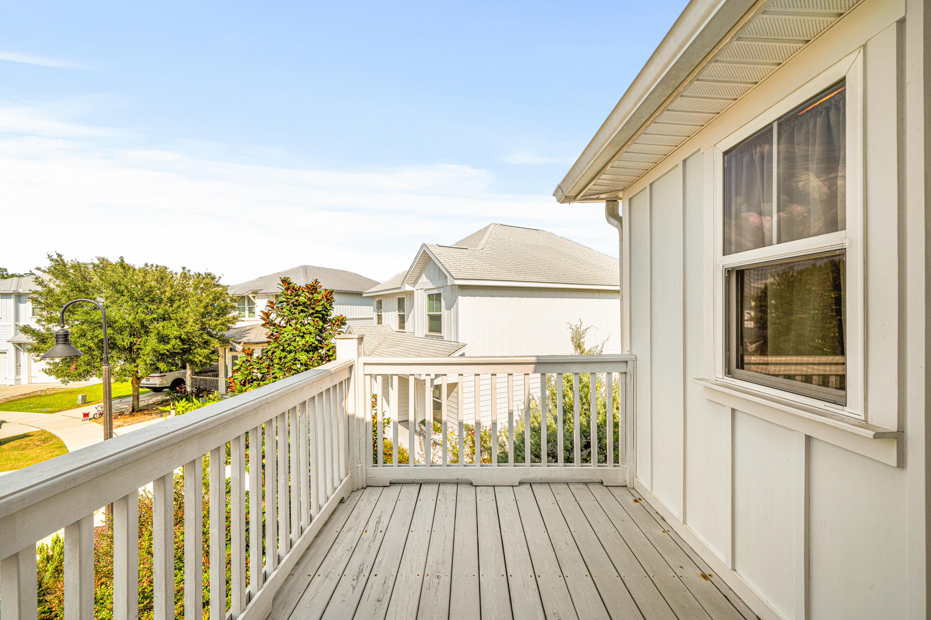 178 Melrose Avenue Santa Rosa Beach, FL 32459 - Photo 21 of 45 a view of a balcony with wooden floor and fence