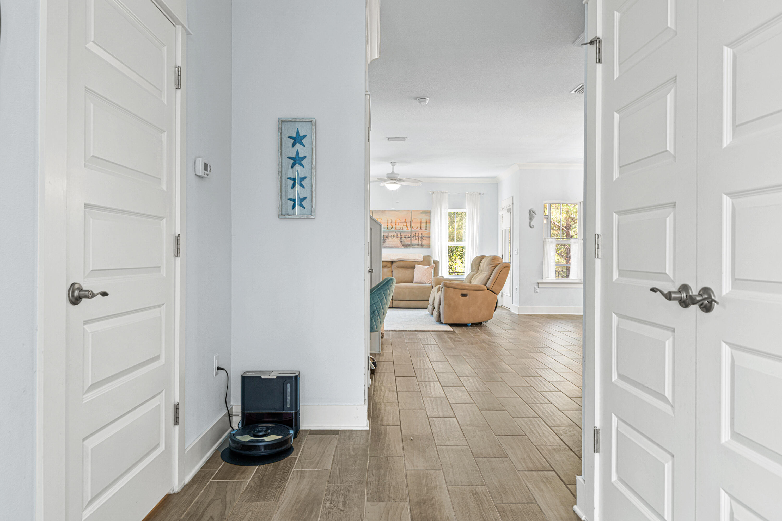 178 Melrose Avenue Santa Rosa Beach, FL 32459 - Photo 34 of 45 a living room with furniture and a gate