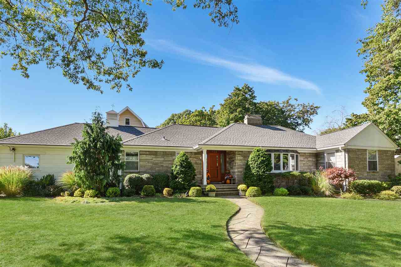 125 Fairview Avenue Rutherford, NJ 07070 - Photo 1 of 1 a front view of a house with garden