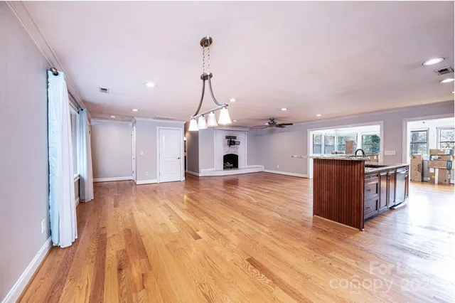 a view of a kitchen and a chandelier