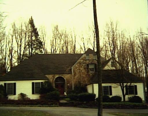 120 Belden Hill Road Wilton, CT 06897 - Photo 1 of 1 a front view of a house with a yard