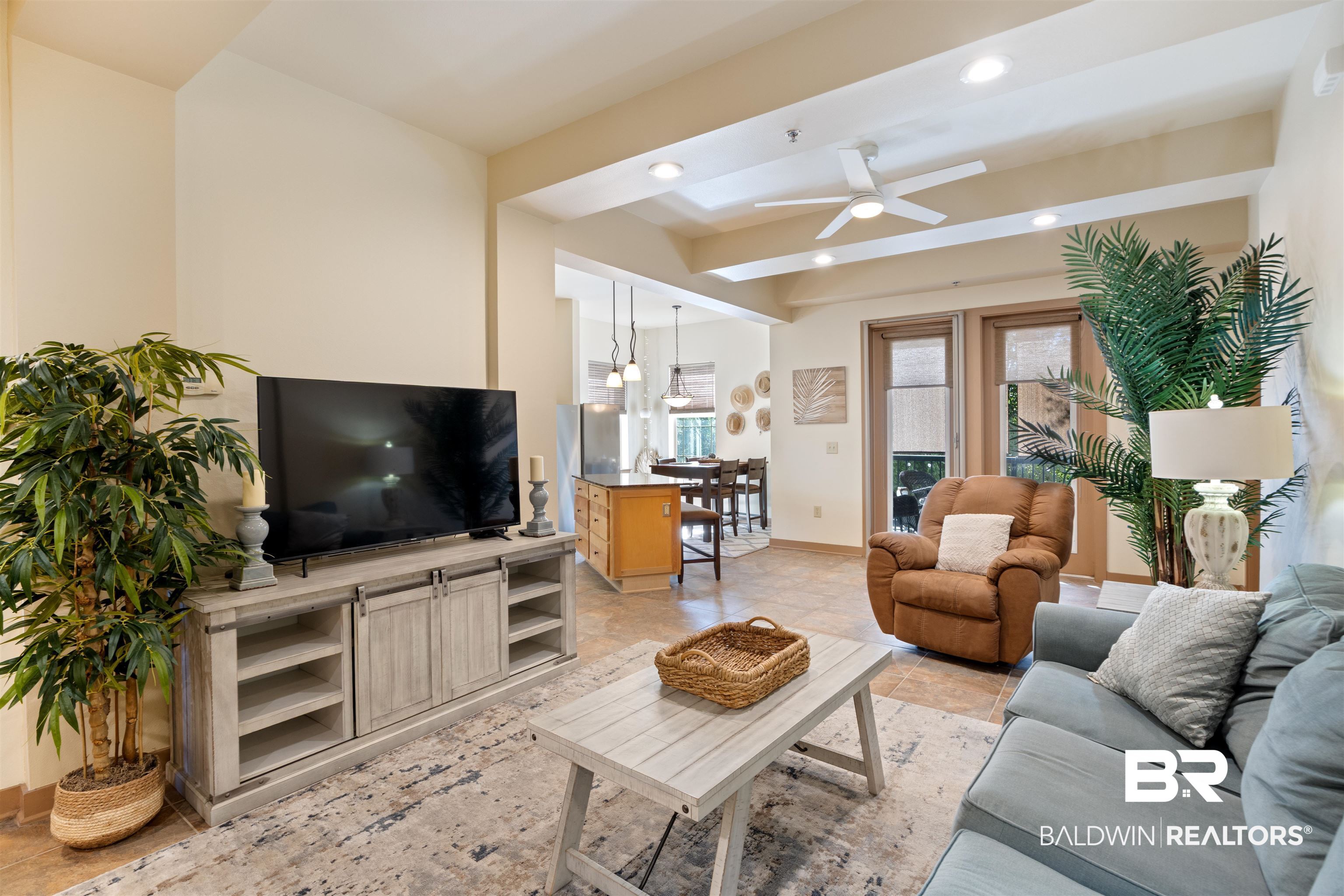 1430 Regency Road, Unit B201 Gulf Shores, AL 36542 - Photo 11 of 59 Living room featuring ceiling fan, recessed lighting, and beamed ceiling