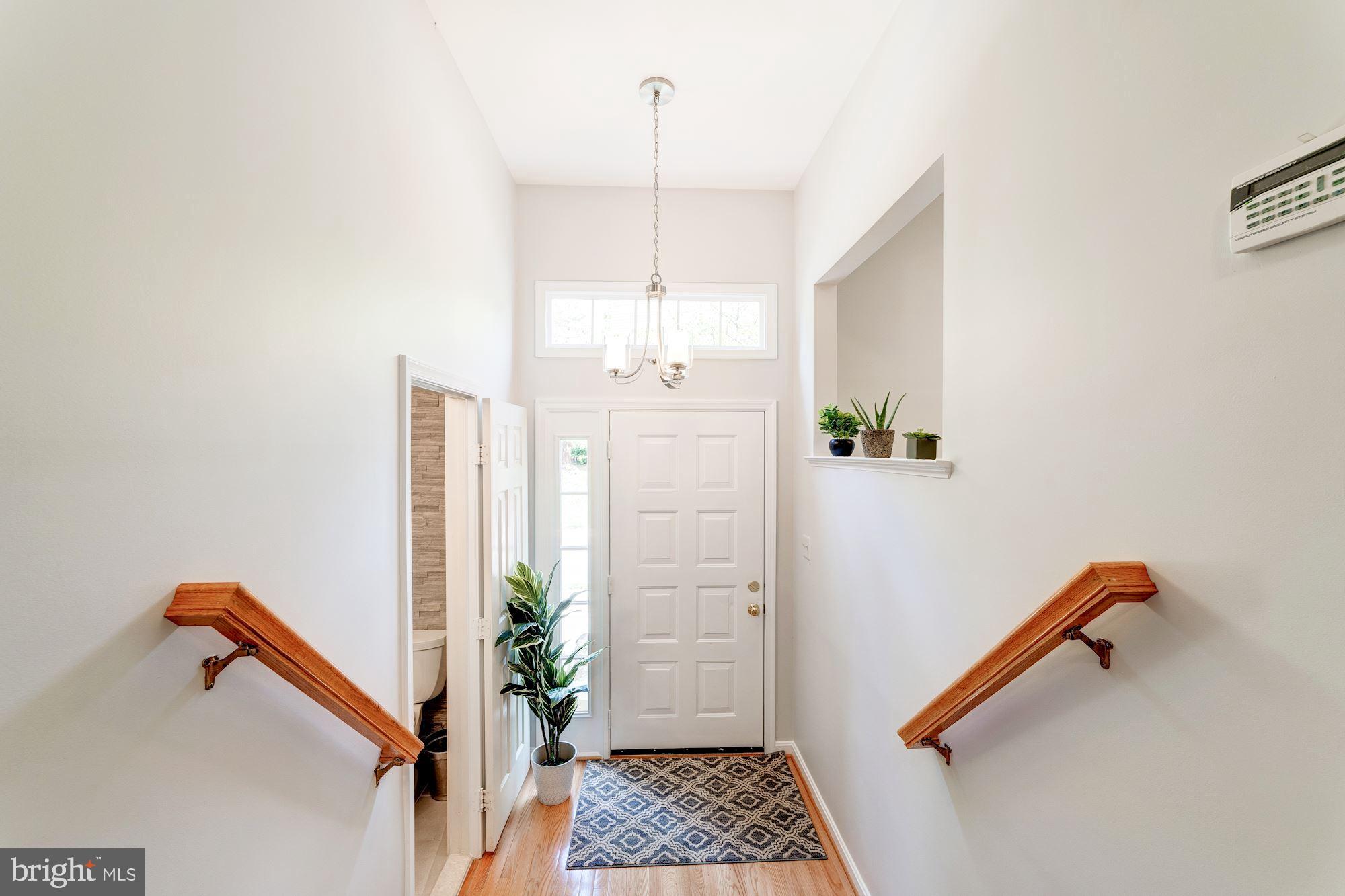 1283 Weatherstone Court Reston, VA 20194 - Photo 2 of 38 a bathroom with a shower