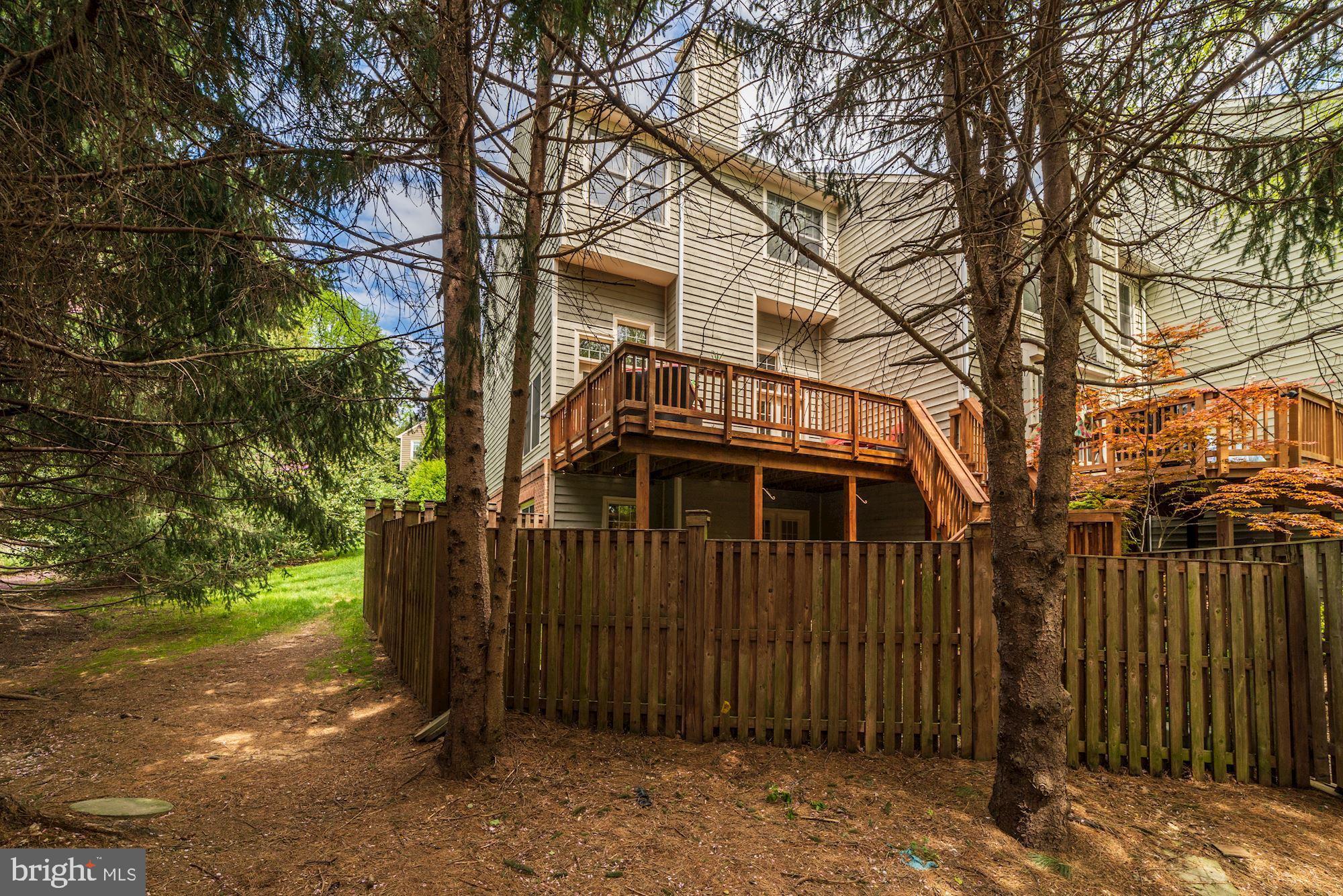 1283 Weatherstone Court Reston, VA 20194 - Photo 35 of 38 a front view of a house with a tree