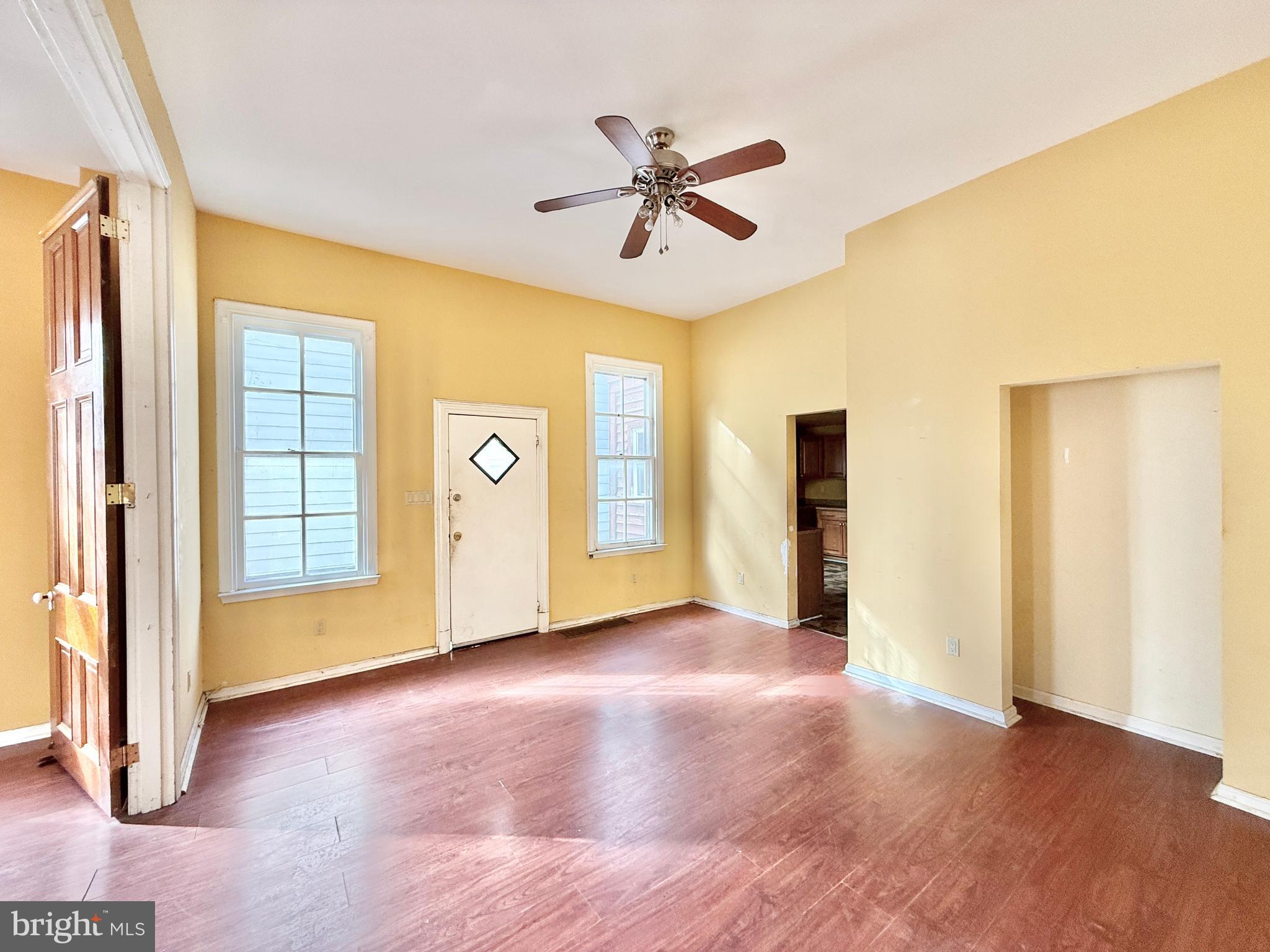 187 7th Street Salem, NJ 08079 - Photo 12 of 26 a view of an empty room with a window