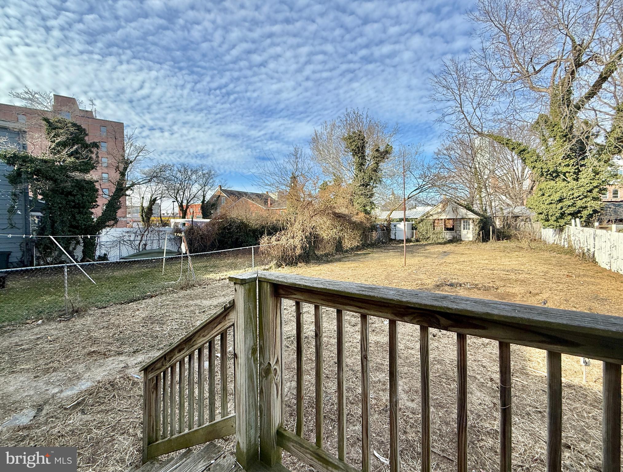 187 7th Street Salem, NJ 08079 - Photo 5 of 26 a view of swimming pool from a balcony