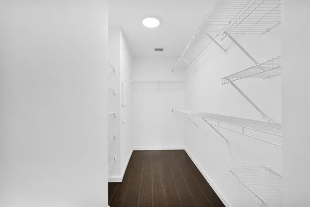 a view of a hallway with washer and dryer