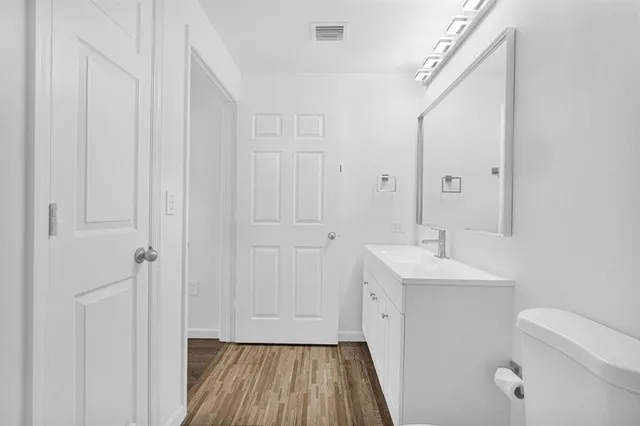 a swimming pool with outdoor seating and yard