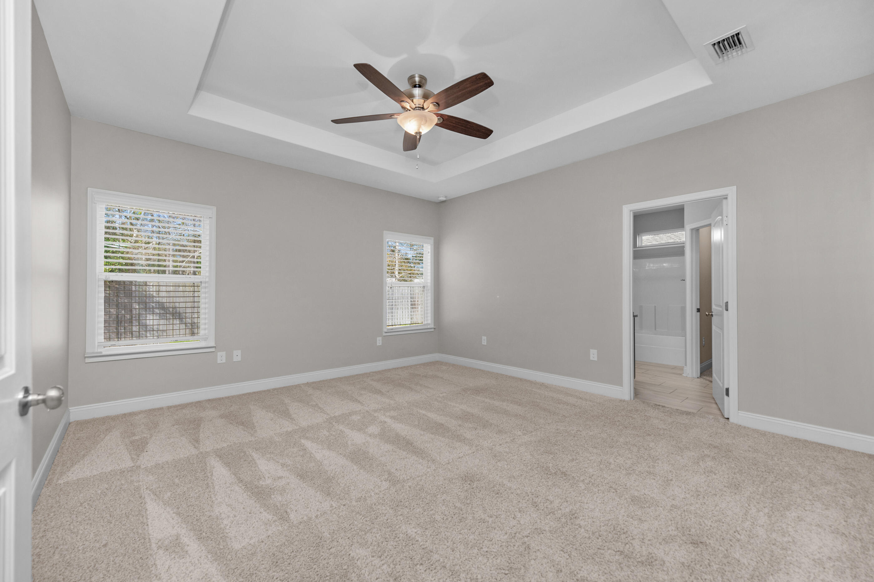2285 Tom Street Navarre, FL 32566 - Photo 17 of 36 a view of an empty room with a window