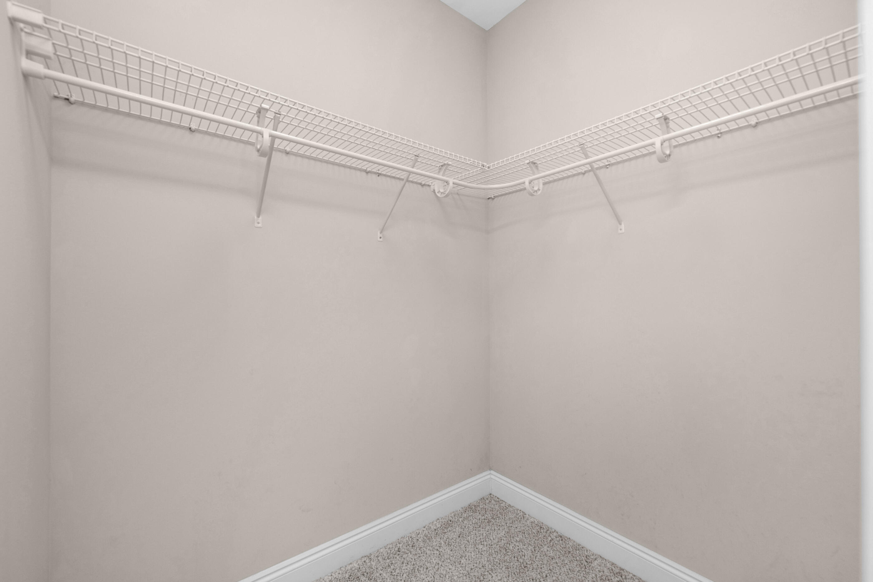 2285 Tom Street Navarre, FL 32566 - Photo 27 of 36 a view of a room with racks on the wall