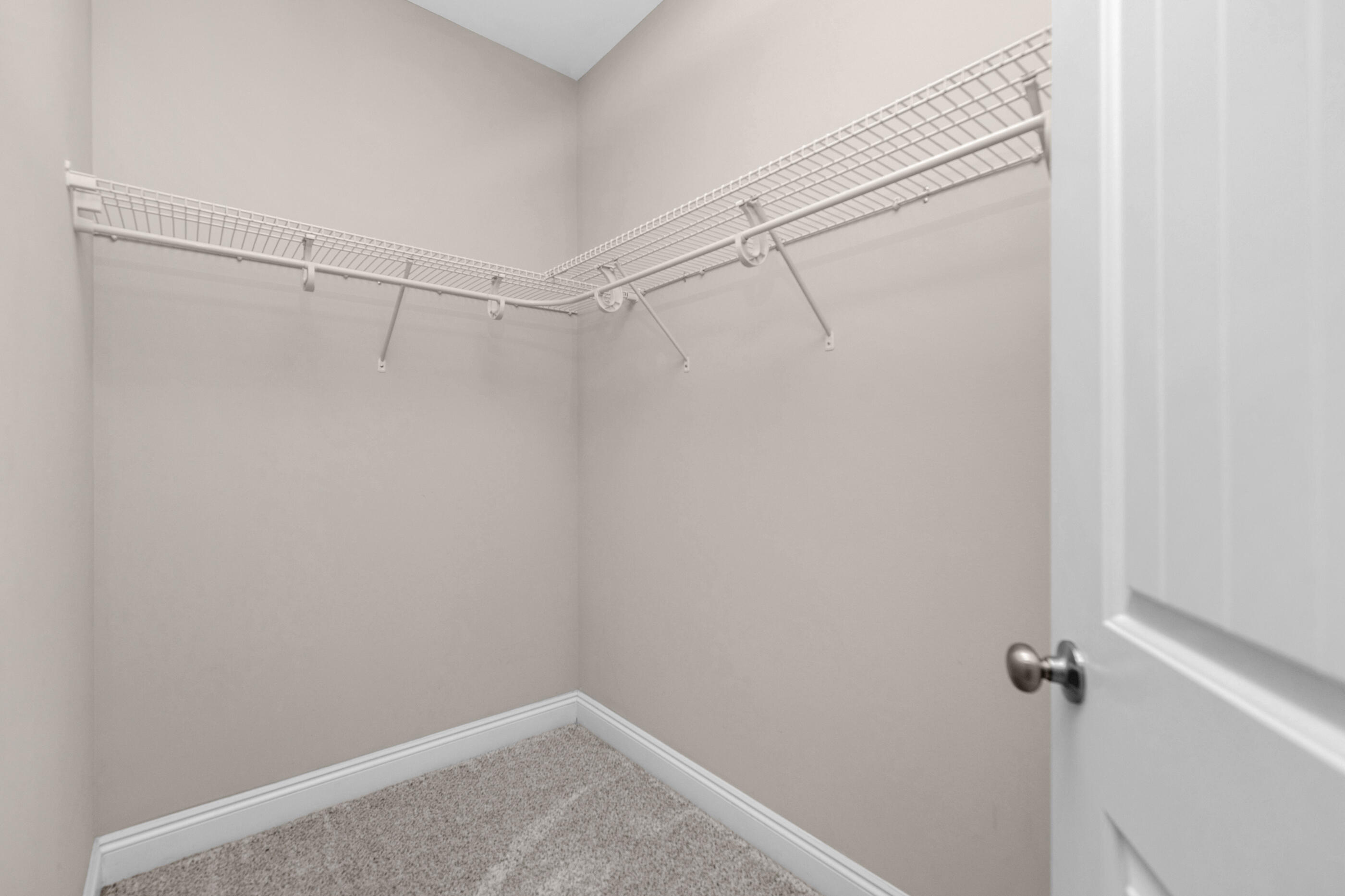 2285 Tom Street Navarre, FL 32566 - Photo 28 of 36 a view of a room with racks on the wall