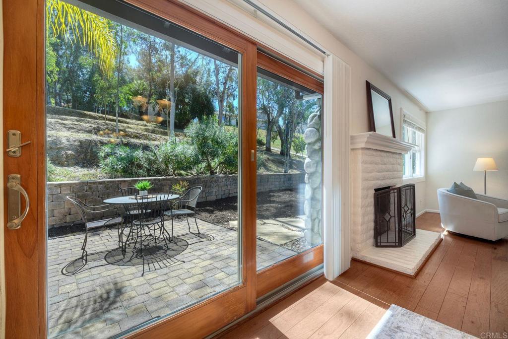 2830 Green Canyon Road Fallbrook, CA 92028 - Photo 9 of 43 Beautiful wood framed sliders leading off the dining room onto one of several patios