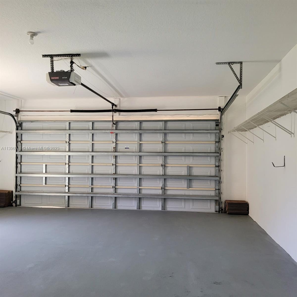 8380 Lords Place, Unit 8380 Boynton Beach, FL 33472 - Photo 16 of 21 a view of store room with racks