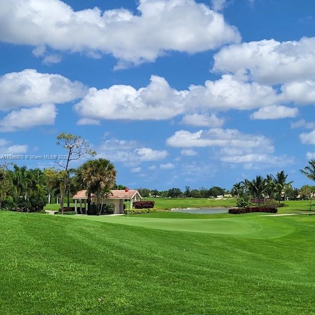 8380 Lords Place, Unit 8380 Boynton Beach, FL 33472 - Photo 17 of 21 a view of building with outdoor space