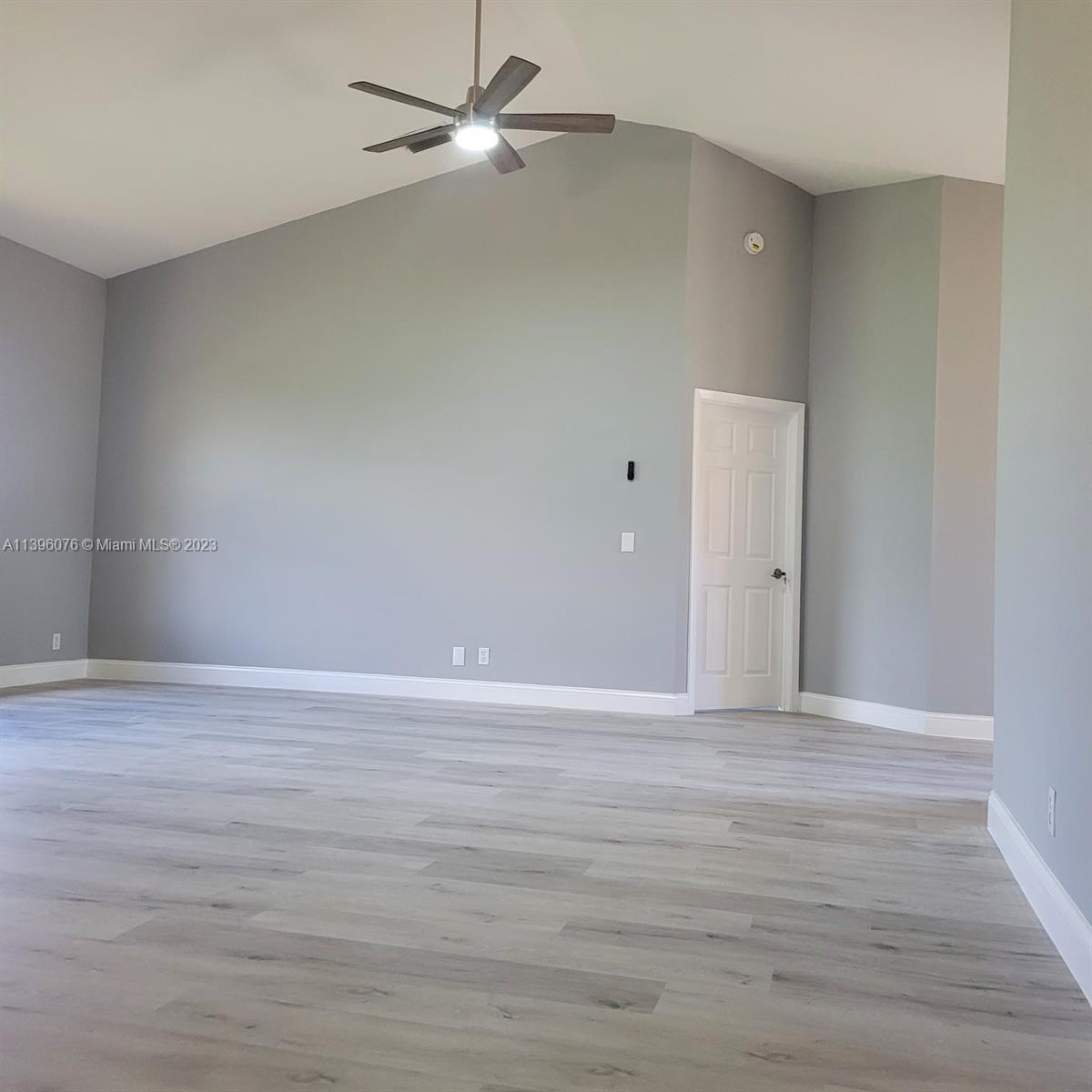 8380 Lords Place, Unit 8380 Boynton Beach, FL 33472 - Photo 8 of 21 wooden floor in an empty room
