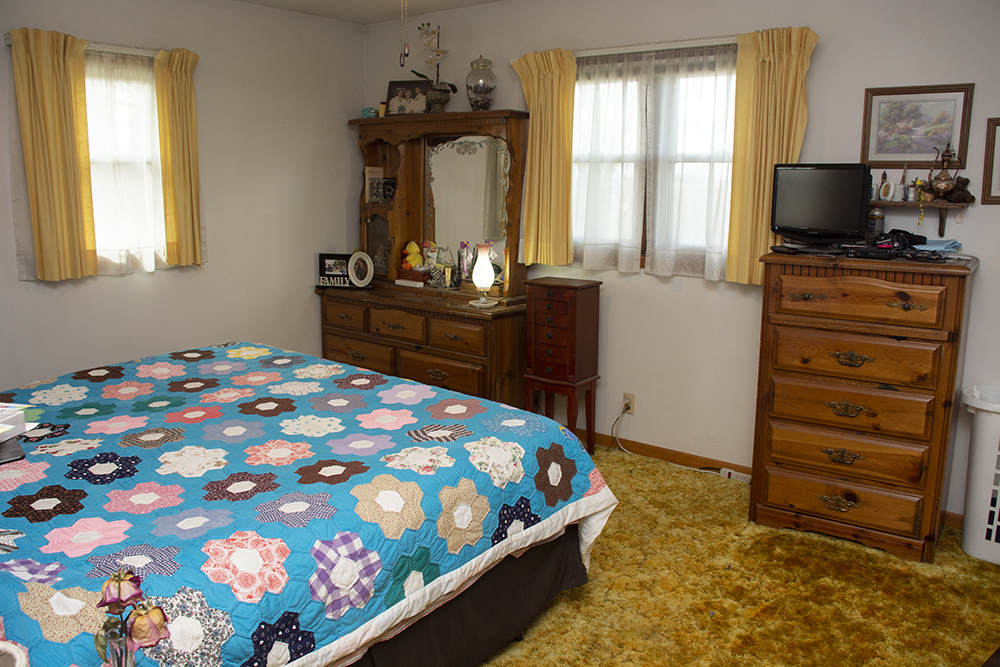 18474 Holly Road Morrison, IL 61270 - Photo 32 of 45 a bedroom with a bed and furniture