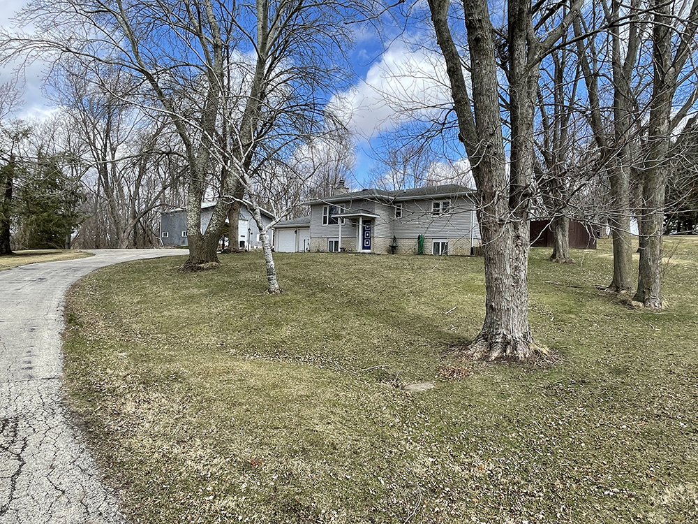18474 Holly Road Morrison, IL 61270 - Photo 4 of 45 a view of a house with a yard
