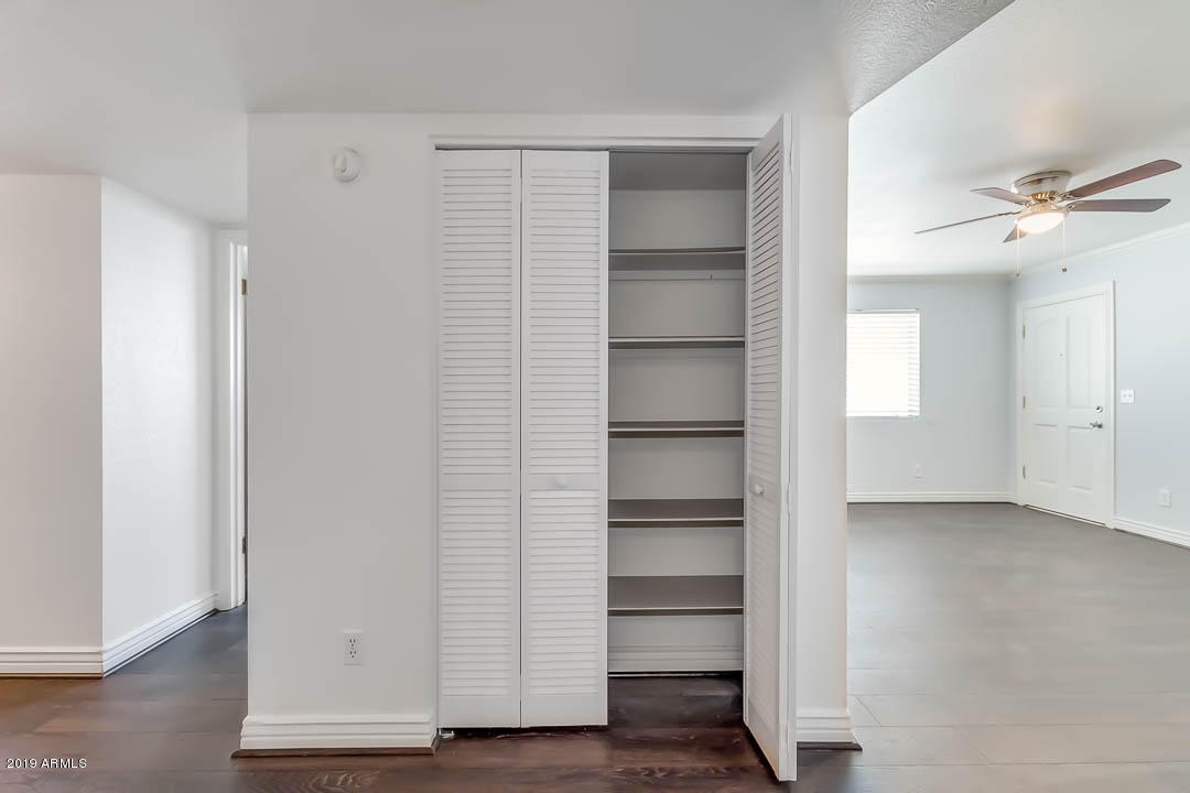 1860 East Inverness Avenue Mesa, AZ 85204 - Photo 16 of 29 a view of walk in closet with empty racks